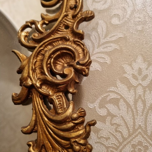 Rococo style wall mirror with gold embossed frame