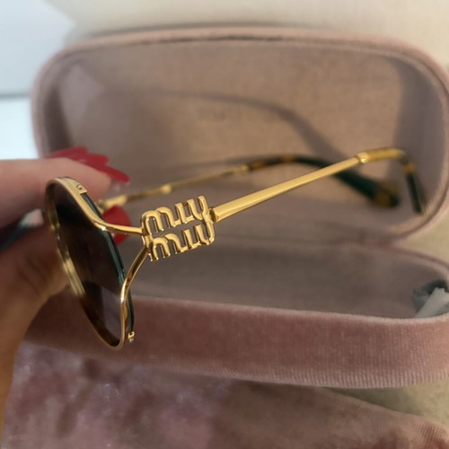 Miu Miu SMU52Y sunglasses like new, multicolor metal frame