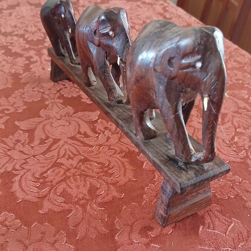 Wooden elephant set on base, like new, three sizes, handmade