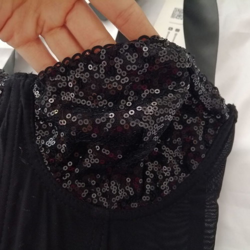 Women's black bustier corset top with sequins and sheer waist