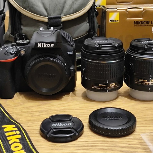 Nikon D3500 DSLR camera body with 3 lenses and accessories