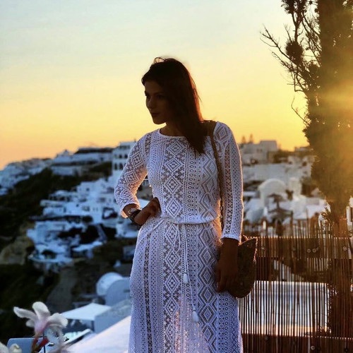 White midi crochet dress with geometric patterns and long sleeves