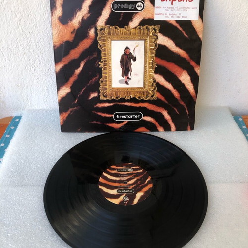Prodigy Firestarter vinyl used, with partially worn cover