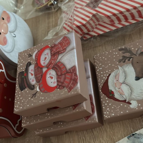 Craft supplies like new, boxes, stickers, decorative flowers and shells