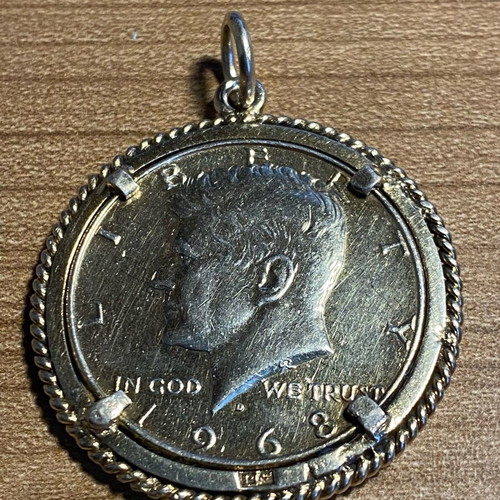 Collectible pendant large 1968 half dollar coin with silver wreath, like new