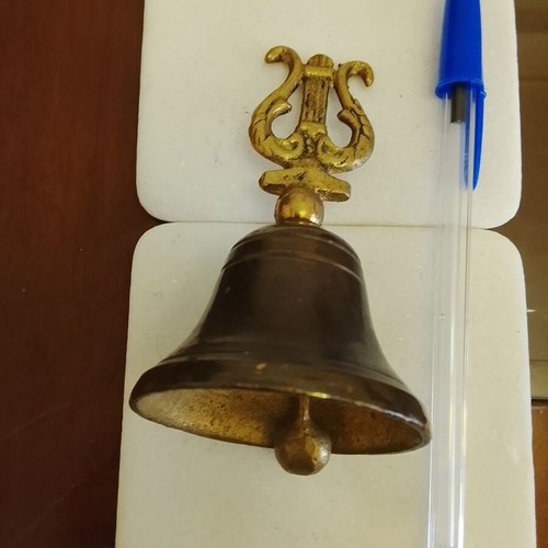 Vintage brass hand bell with ancient lyre handle, used, functional