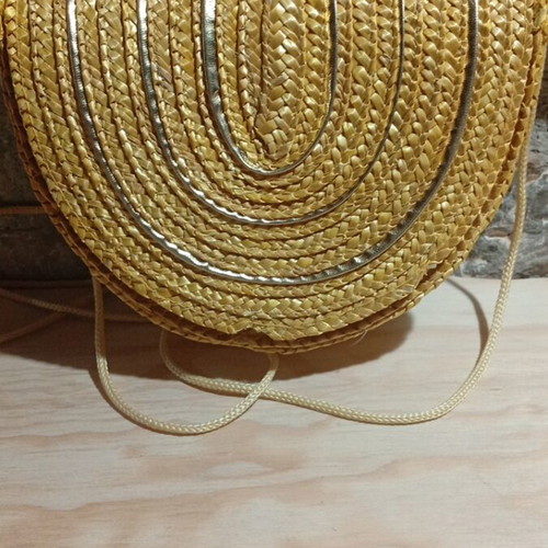 Straw crossbody bag like new, yellow and gold with cord