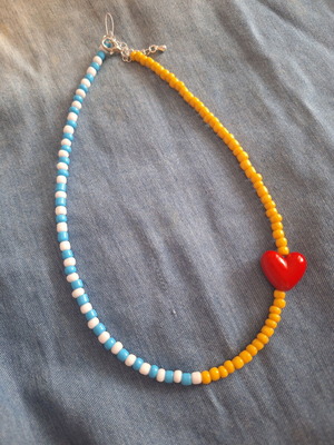 Handmade necklace with beads and heart element, new, blue and yellow