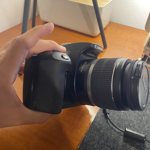 Canon EOS 1000D DSLR with EF-S 18-55mm IS lens, used