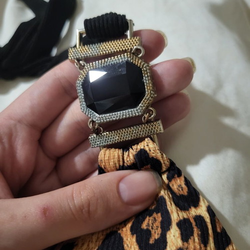 Swimsuit with leopard print and black stones used, size S
