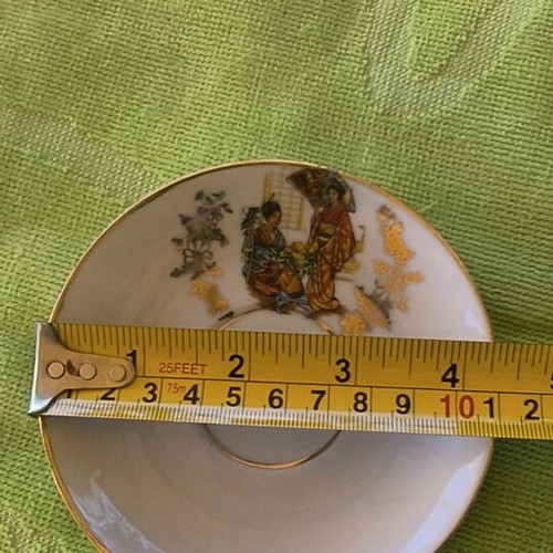 Kutani porcelain decorative cups with lithographs and gold trim used