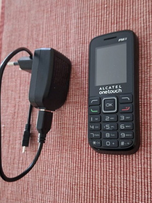 Alcatel onetouch cell phone like new without scratches