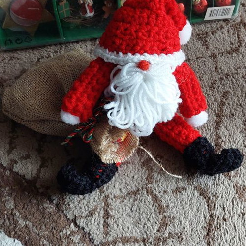Handmade knitted Santa Claus with candy sack new