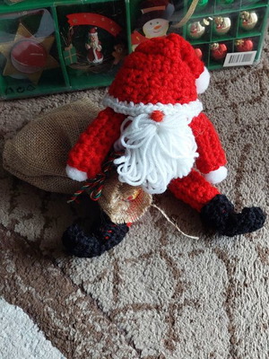 Handmade knitted Santa Claus with candy sack new