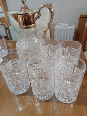 Vintage crystal pitcher with 6 glasses used
