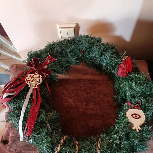 Handmade Christmas wreath with charms and battery lights