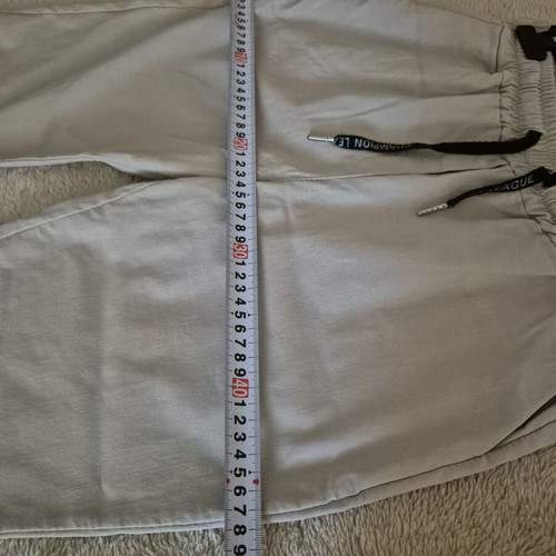 Beige elastic pants size L like new with side pockets and drawstring waist