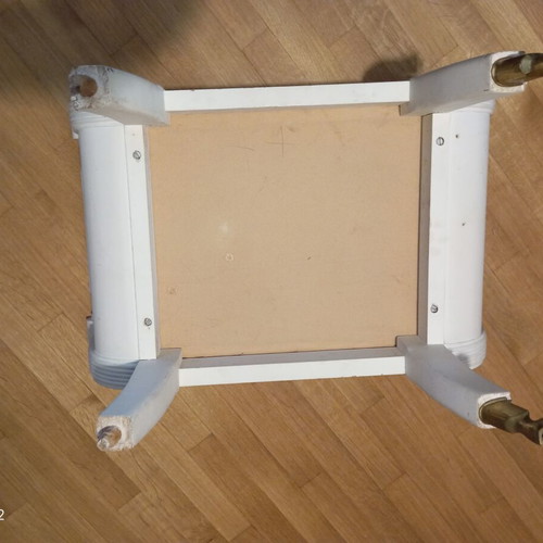 Stool used, missing two legs