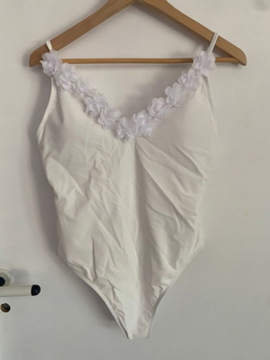 Ladies white swimsuit with flower details, size medium