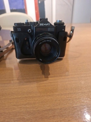 Zenit 11 camera used with Helios 44M 58mm f/2 lens and flash