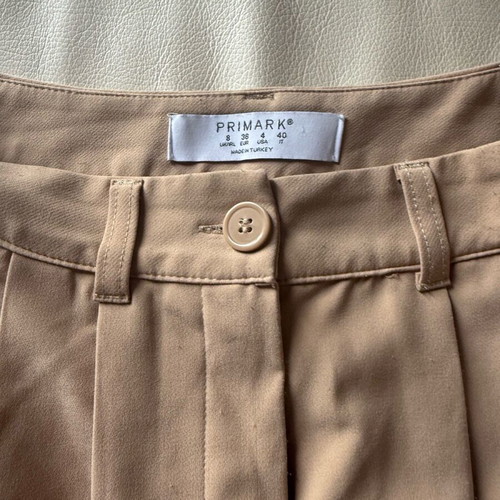 Beige short skirt Primark like new, small