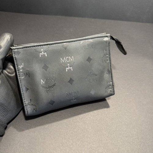 MCM Monogram Mini Toiletry Bag used, black with gold zipper