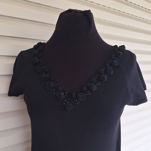 Black blouse new with decorative organza roses neckline, size M