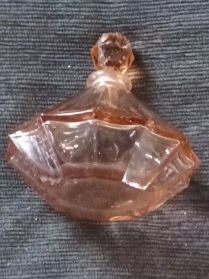 Vintage crystal perfume bottle in pink-peach shade like new