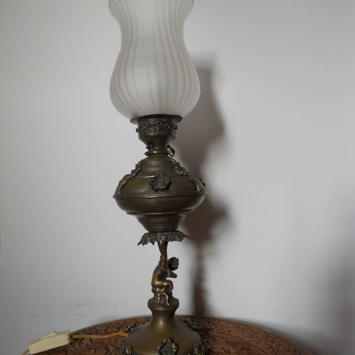 Bronze table lamp with putto used, authentic antique
