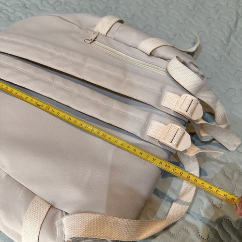 Beige travel bag backpack, used