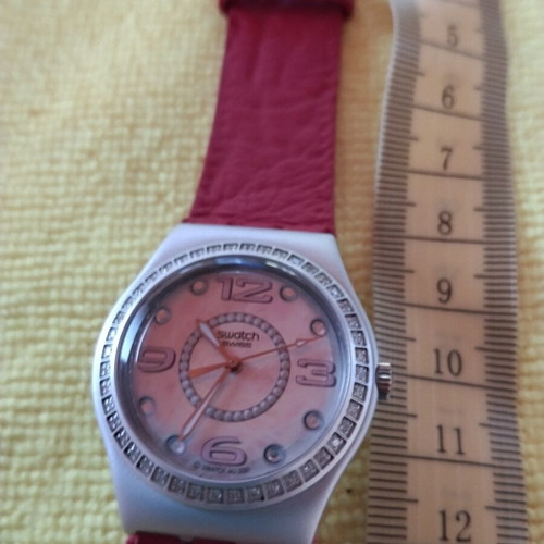 Swatch collectible watch with stones and leather strap, red and pink