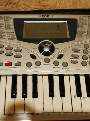 Medeli MC37A electronic keyboard used with case