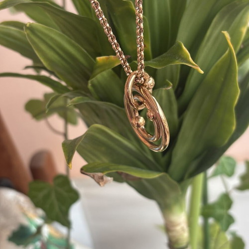 Folli Follie necklace with concentric circles like new, rose gold plated stainless steel