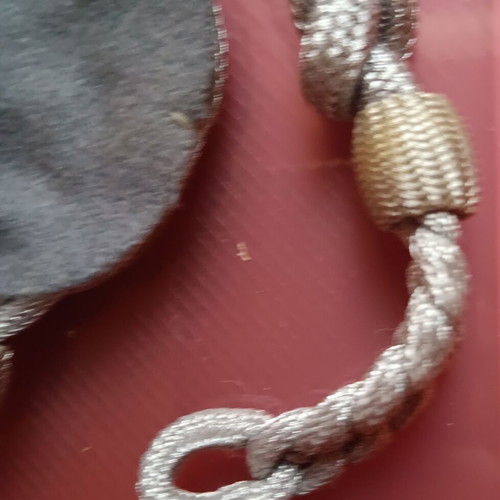 Collectible German uniform shoulder cord badge like new