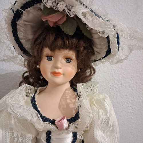 Porcelain doll 55cm used in very good condition