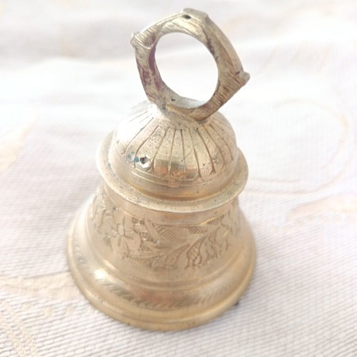 Bronze bell used with traditional engraved floral motifs