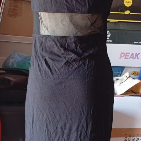 Sexy black dress size M like new with sheer panels