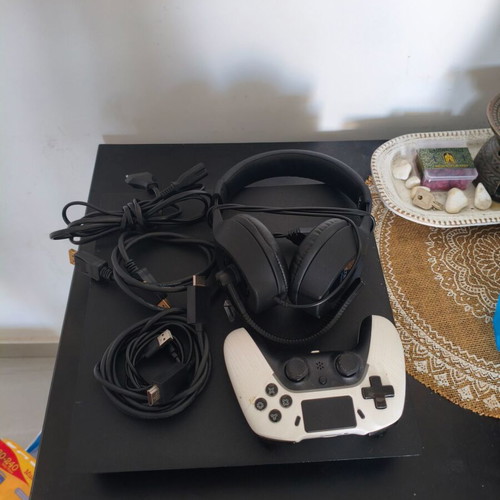 PlayStation 4 Pro 1TB like new with headset and extra controller