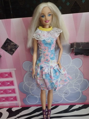 Vintage Barbie doll with vintage dress