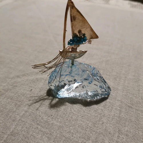 Table lucky charm like new with sailboat figurine