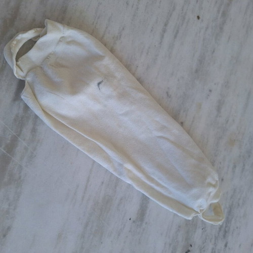White fabric face mask used with filter pocket