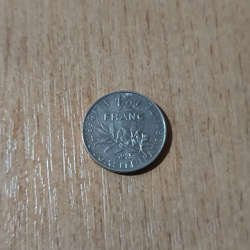 Collectible 1/2 Franc France coin 1975 used, nickel