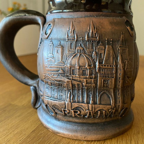 Handmade ceramic mug with embossed Prague monuments like new