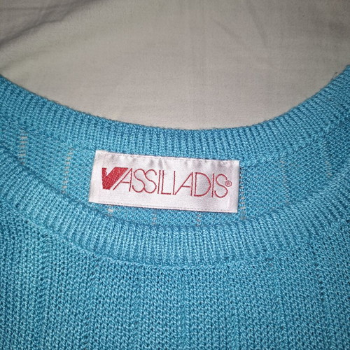 Turquoise knitted top with short sleeves like new