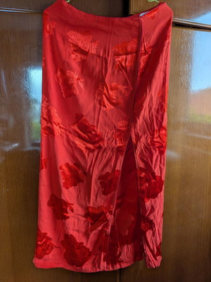 We Coss skirt size medium red with slit and embossed flowers like new