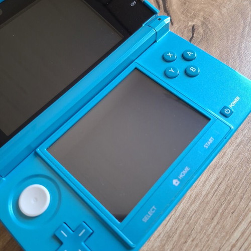 Nintendo 3DS Coral Blue like new with original stylus and USB cable