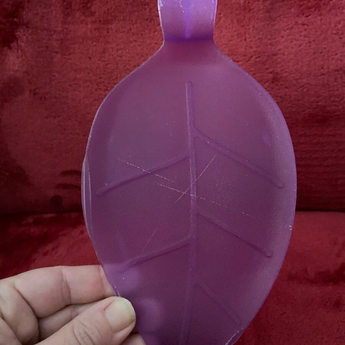 Spoon holder used, plastic, purple color, leaf design