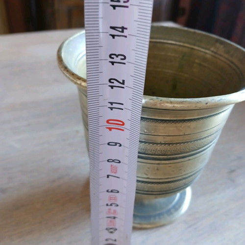 Antique brass mortar used with subtle design