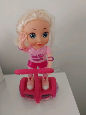 Balance doll with wheels, music and lights like new