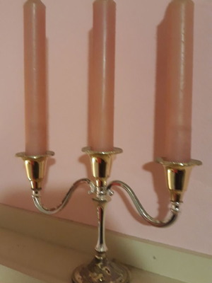 Metal candlestick like new with candles
